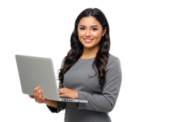 A professional woman with long dark hair, wearing a gray dress, holding a laptop while smiling confidently isolated on transparent background