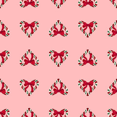 Seamless heart-shaped candy cane pattern with bowknot