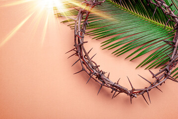 crown of thorns and palm leaves