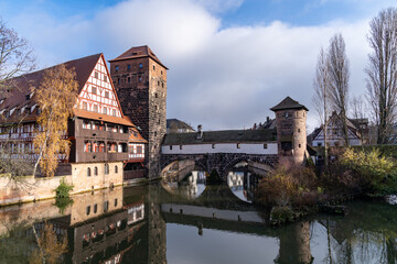 Obraz premium View from the famous Maxbrucke bridge in this historic old town of Nuremberg Germany, Bavaria, with reflection, taken in winter
