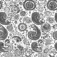 Intricate black and white paisley pattern with swirling designs and detailed motifs on a white background.