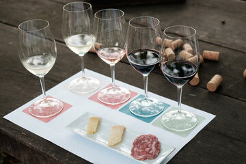 Collection of wine glasses on wooden table