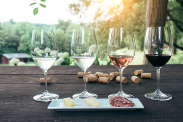 Collection of wine glasses on wooden table