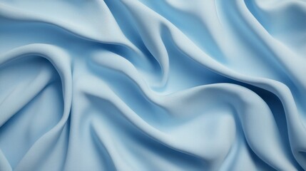 Obraz premium Soft Light Blue Fabric Texture with Elegant Drapery and Smooth Creases Ideal for Backgrounds and Textiles, Perfect for Fashion, Design, and Art Projects