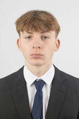Teenage boy wearing a suit