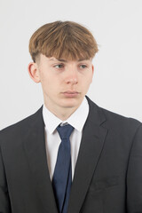 Teenage boy wearing a suit