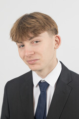 Teenage boy wearing a suit