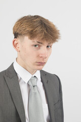 Teenage boy wearing a suit