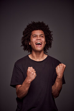 Studio Portrait of a young mixed race man.