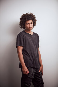 Studio Portrait of a young mixed race man.