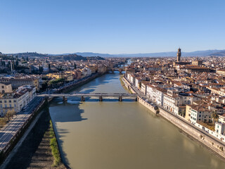Obraz premium Aerial drone photo of the river Arno in the city center of Florence, Italy.