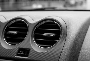 heating cooling ac air conditioning vents inside car dashboard (round fan adjustment adjustable controls) knob dash drive driving comfort