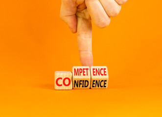Competence and confidence symbol. Concept word Competence Confidence on wooden cubes. Businessman...