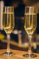 Glass glasses of champagne, people celebrating an important event, festive toast