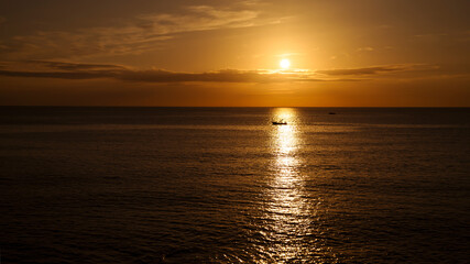 Sunset in the sea in orange tones, Sardinia