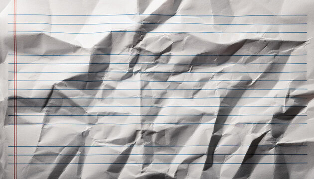 close up of graph ruled composition or exercise book paper with rough crumpled texture