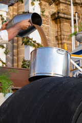 Harvest festival in Jerez de la Frontera, first pressing of grapes juice and filling of first...