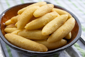Schupfnudel or Fingernudel, finger noodle, dumpling or thick noodle in German and Austrian cuisine, similar to Central European kopytka and Italian gnocchi