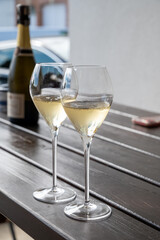 Tasting of brut and reserve grand cru champagne sparkling wine produced by traditional method in Mesnil-sur-Oger in Champagne, France