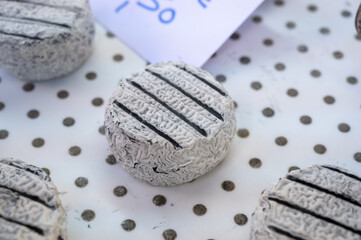 Cheese collection, French Cendre Lait cru Chevre cheese made from goat milk with ash in Souillac, Perigord region in France