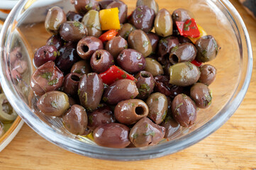 Pickled and marinated olives Ligurian style, tasty Italian starters, antipasti, tapas