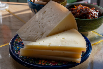 Cheese collection, Spanish matured cheese and onion chutney close up