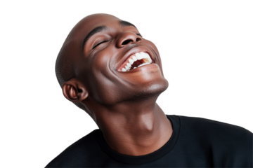 Smiling man expressing joy with a bright smile against a plain white background during a cheerful moment