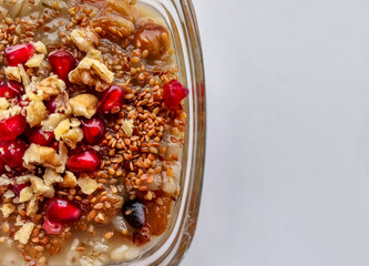 Ashure dessert with legumes and dried fruits named aşure or asure . Noah’s pudding in the bowl.