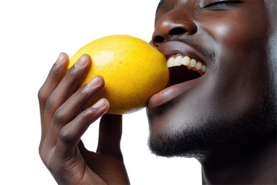 Smiling man holding a lemon for a joyful portrait against a white background