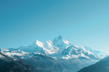 Obraz premium Pristine Snow-Capped Mountains Against a Brilliant Blue Sky
