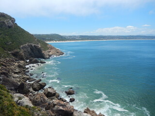 Panoramic Coastal View with Cliffs and Blue Waters