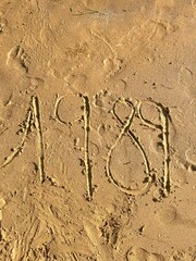1989 written in sand
