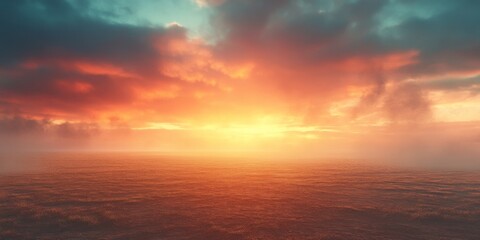 Golden sunset sky over calm ocean waves on the horizon