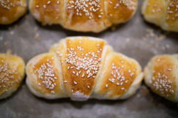 Close up of homemade mini croissants on a sheet pan