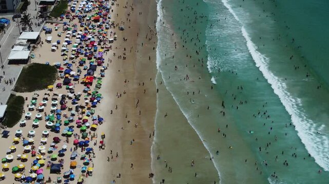 Aerial drone footage of Praia do Per&oacute; (Per&oacute; Beach) in Cabo Frio, Rio de Janeiro, Brazil. Featuring golden sands, clear waters, and a stunning coastline ideal for relaxation and outdoor activities.