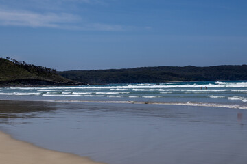 Crashing waves against a rocky shore. Powerful ocean energy along the Australian coast.