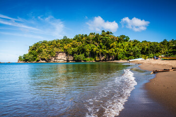 Empty beach on the edge of Soufriere, a town on the West Coast of Saint Lucia, in the eastern...