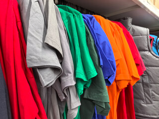 Vibrant collection of casual t-shirts displayed in a retail store