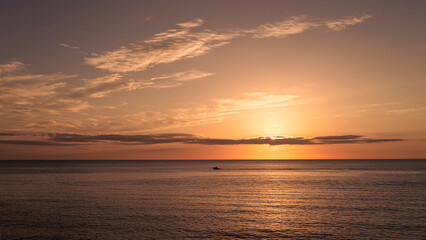 Sunset in the sea in orange tones, Sardinia