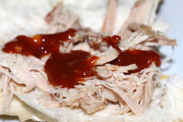 shredded pork with guava sauce. meal details. food details. bread with meat and sauce.