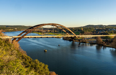 Pennybacker suspension bridge or 360 Bridge from overlook by Colorado River near Austin TX