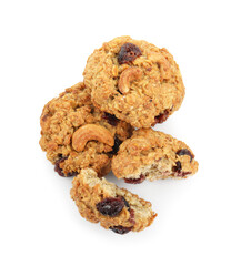 Delicious oatmeal cookies with dried cranberries and nuts isolated on white, top view