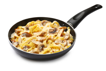 Tasty Alfredo pasta with chicken and mushrooms in frying pan isolated on white