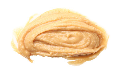 Sample of tasty nut butter isolated on white, top view