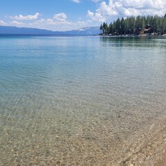 crystal clear lake and mountains