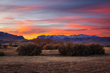 Sunset over the mountains and sagebrush of Wyoming, USA.