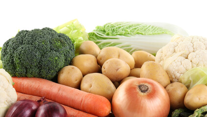 Many different ripe vegetables isolated on white