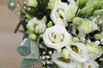 Beautiful wedding bouquet on light background, closeup.