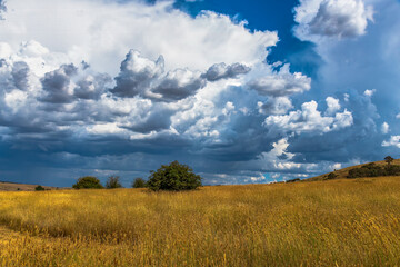 Afternoon storm clouds over the rural countryside