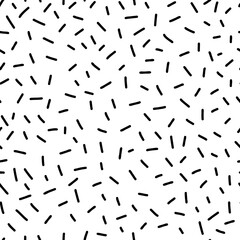 Small dash seamless pattern. Abstract Memphis style background, retro confetti black and white texture, simple geometric shapes, playful design. Perfect for prints, and textiles. Vector illustration